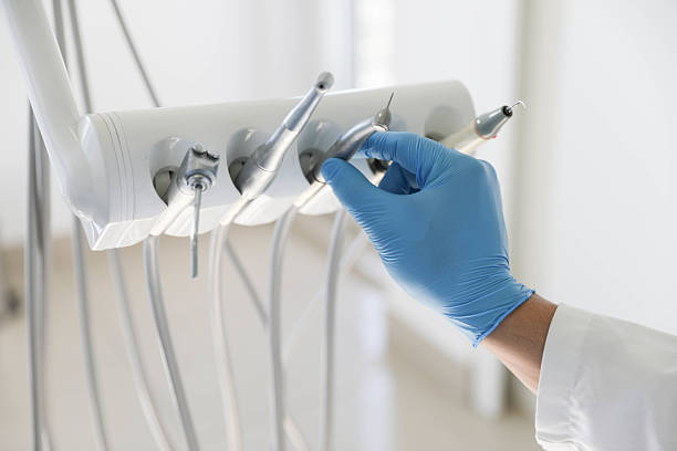 Professional Tooth Extraction technician working in Goodrich, MI